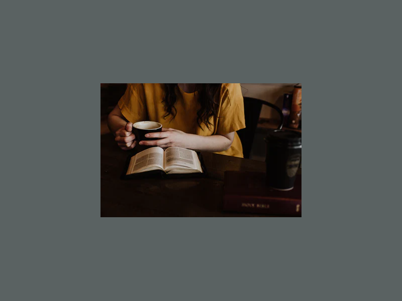 Woman Reading Book with drink