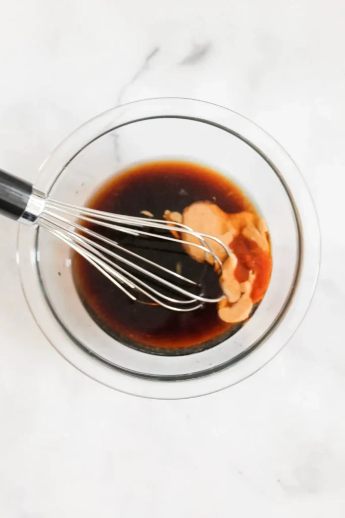 pad thai sauce which contains peanut butter, water, brown sugar, soy sauce, sriracha, and lime juice