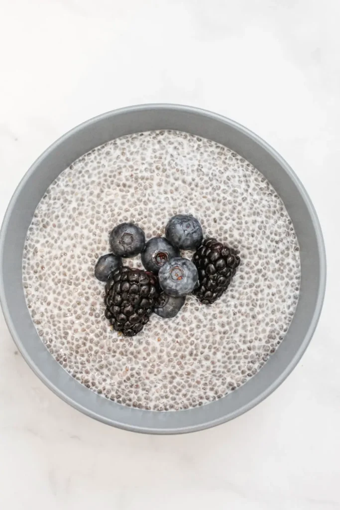 Vegan chia seed pudding with blackberries and raspberries on top