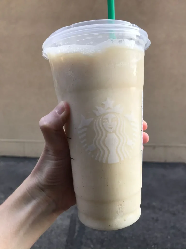 holding a vanilla bean frappuccino with soy milk, toffee nut syrup, and no whipped cream 