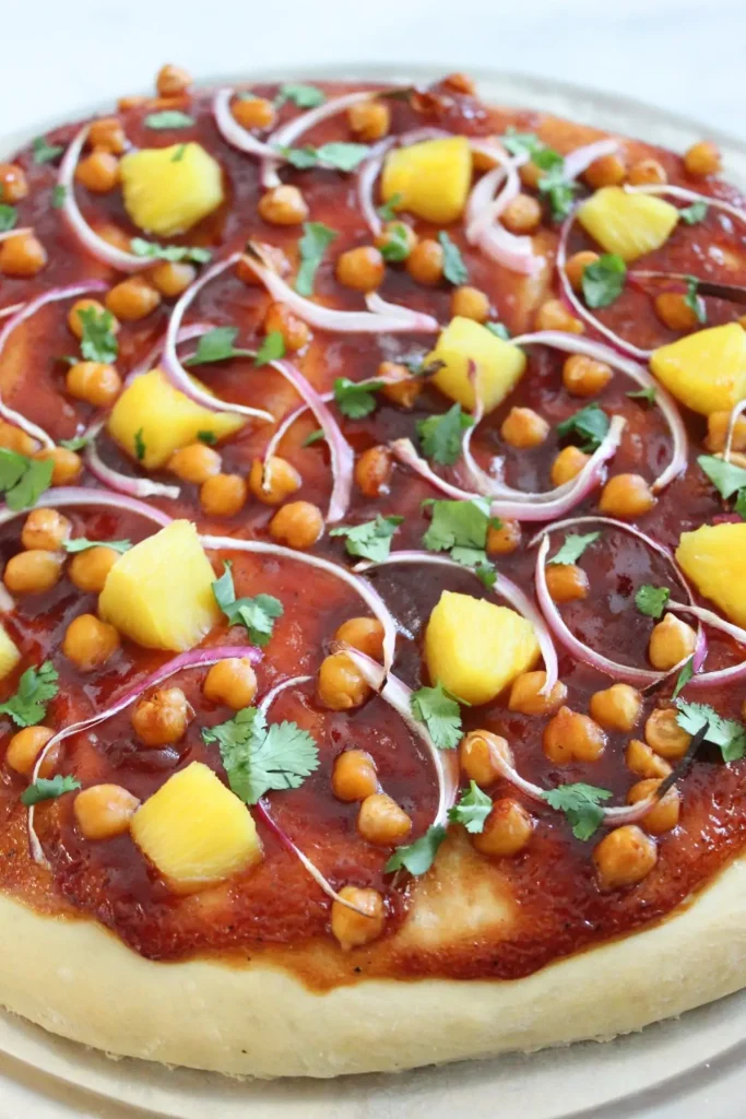 close up view of completed vegan bbq pizza finished with fresh cilantro