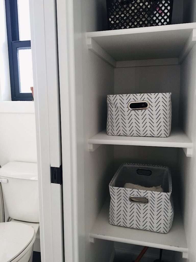 cloth bins in linen closet