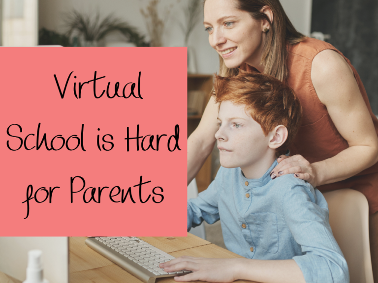 a mother standing behind a child working at a computer.