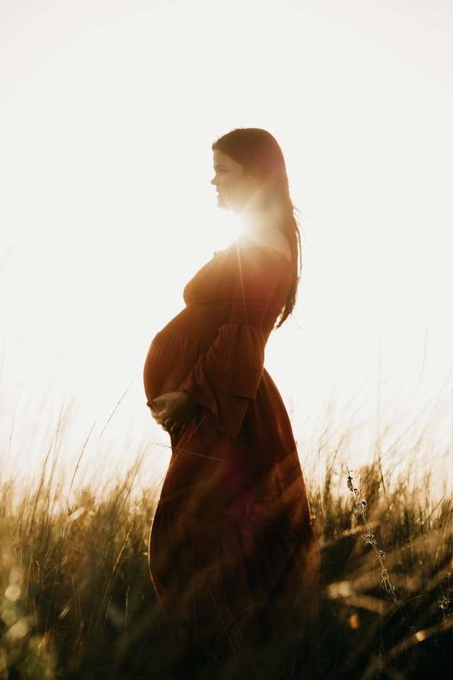 pregnant woman in field